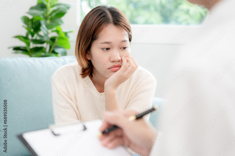 woman with mental health problems is consulting. psychiatrist is recording the patient's condition for treatment. encouragement, love and family problem, bipolar , depression patient, protect suicide woman with mental health problems is consulting. psychiatrist is recording the patient's condition for treatment. encouragement, love and family problem, bipolar , depression patient, protect suicide