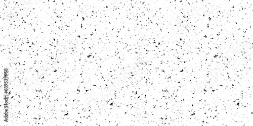Black and white mottled seamless pattern. Small grunge sprinkles, particles, dust and spots texture. Noise grain repeating background. Overlay random grit wallpaper. Vector illustration