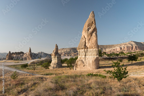 fairy chimneys of Cappadocia near a hiking trail, Red Valley, Cappadocia, Turkey