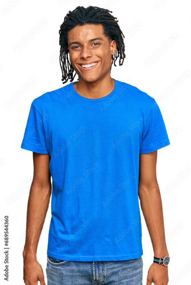 Young african american man wearing casual clothes with a happy and cool smile on face. lucky person. Young african american man wearing casual clothes with a happy and cool smile on face. lucky person.