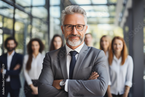 businessman with his team in a bright glass office. successful team business concept