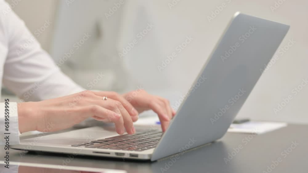 Close up of Woman Typing on Laptop Close up of Woman Typing on Laptop
