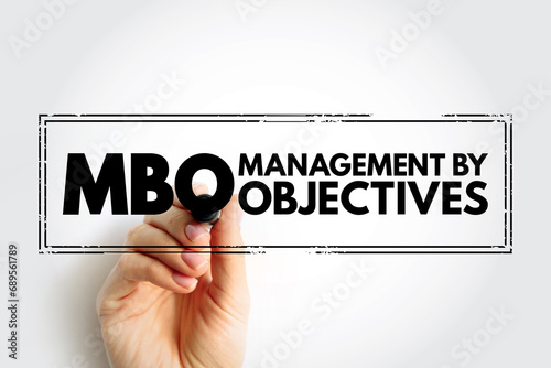 MBO Management By Objectives - strategic approach to enhance the performance of an organization, acronym text concept stamp photo