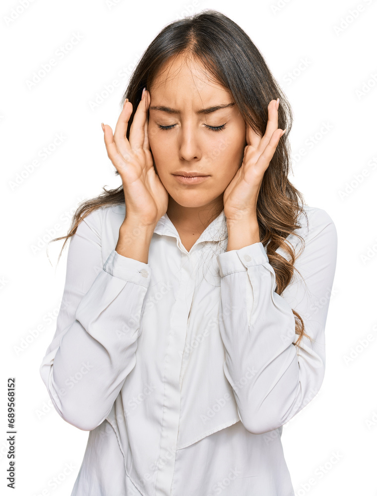 Young brunette woman wearing casual clothes with hand on head for pain in head because stress. suffering migraine. Young brunette woman wearing casual clothes with hand on head for pain in head because stress. suffering migraine.