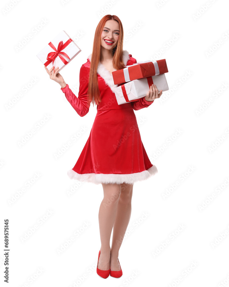 Young woman in red dress with Christmas gifts on white background Young woman in red dress with Christmas gifts on white background