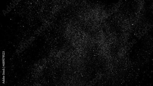 Dust particles on black background, seamless 3D effect. Abstract dust particles with white light bokeh, snow glare and flare sparkles photo