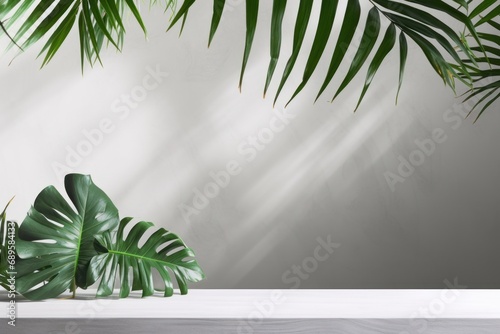 Tropical leaves over grey table casting shadow on white background  Generative AI