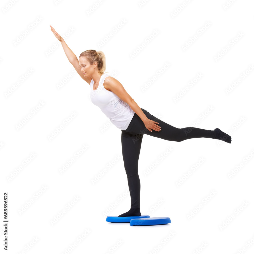 Fototapeta premium Balance, health and stretching with woman on disk in studio for workout, mindfulness or exercise. Wellness, challenge and training with person on white background for flexibility and aerobics