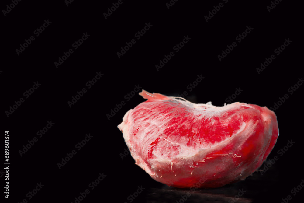 Slice of blood orange fruit isolated on black background. Fresh blood orange Slice of blood orange fruit isolated on black background. Fresh blood orange