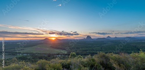 Tourists visit the Wildhorse scenic lookout for sunset panoramic views across the Glasshouse Mountains and the Sunshine Coast in Queensland photo