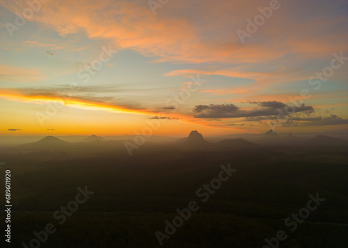 Tourists visit the Wildhorse scenic lookout for sunset panoramic views across the Glasshouse Mountains and the Sunshine Coast in Queensland © hyserb