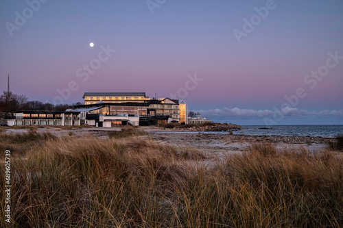 The romantic Marienlyst beach hotel with ryegrass in the foreground