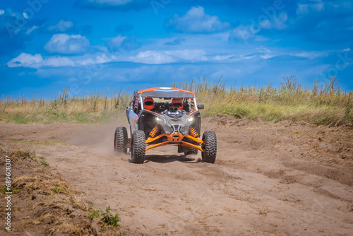 Buggy extreme riding in sandy track. UTV, 4x4, rally