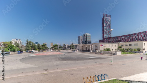 Panorama showing traffic on the Deshmoret e Kombit Boulevard in Tirana timelapse. photo