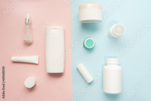 A lot of bottle and jar for cosmetic on two colored background