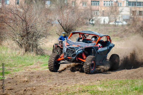 ATV, UTV, buggy, 4x4 off-road vehicle in muddy water. Extreme, adrenalin