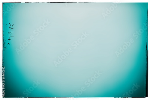 Abstract Turquoise Gradient Background with Retro Photographic Film Effect in Grunge Frame.