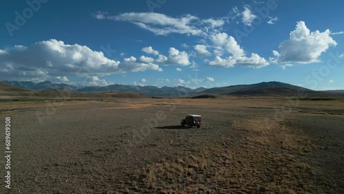 Aerial landscape view of beautiful Deosai plains. A freshwater stream flows through the Deosai National Park Gilgit Baltistan Pakistan.