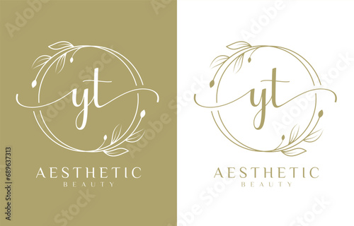 Letter YT Beauty Logo with Flourish Ornament photo