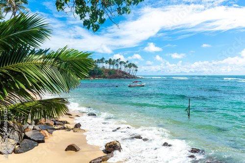 Fototapeta Naklejka Na Ścianę i Meble -  Beautiful Indian Ocean coastline on the island of Sri Lanka, Mirissa.