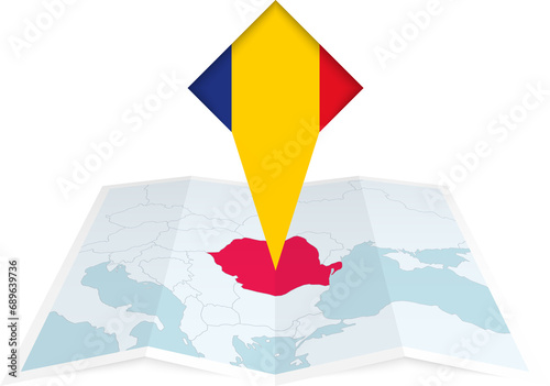 Romania pin flag and map on a folded map