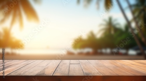 Empty wooden flooring deck in front and blue summer sky with clouds and sea or ocean with turquoise water and waves in the background. Summer vacation sea shoreline with deck floor.