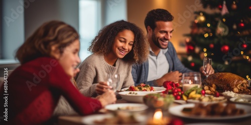Happy and diverse family in a christmas dinner in a modern home
