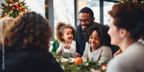 Happy little baby girl and diverse family in a christmas dinner in a modern home photo