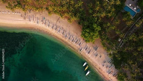 Aerial view of kayak and boats along Kayana Beach, Lombok, Indonesia. photo