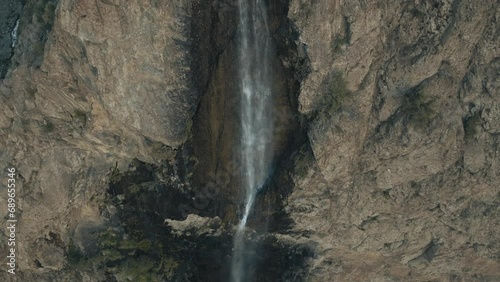 Aerial view reveals Water Fall in full as it goes up around Skardu in the Himalayas, Gilgit Baltistan, Pakistan. photo