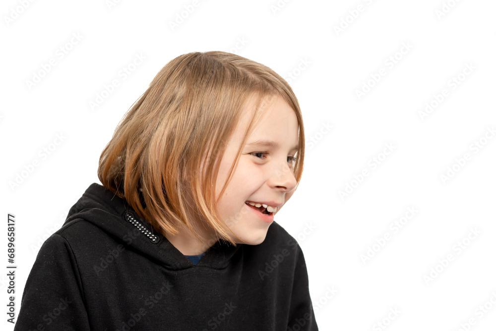 In the spotlight against a pristine white setting, a ten-year-old boy with long hair smiles warmly, exuding pure and innocent joy In the spotlight against a pristine white setting, a ten-year-old boy with long hair smiles warmly, exuding pure and innocent joy