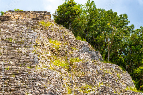 Coba Maya Ruins Nohoch Mul pyramid in tropical jungle Mexico. photo