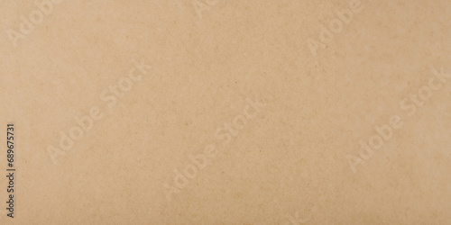 Brown craft paper texture background or cardboard surface for design 