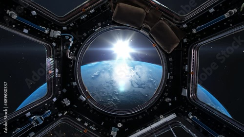 View from a porthole of space station on Earth background. Elements of this image furnished by Nasa. photo