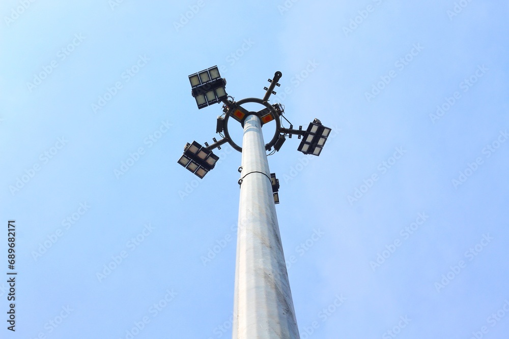 The uniquely shaped street lights were photographed when the sky was bright blue
