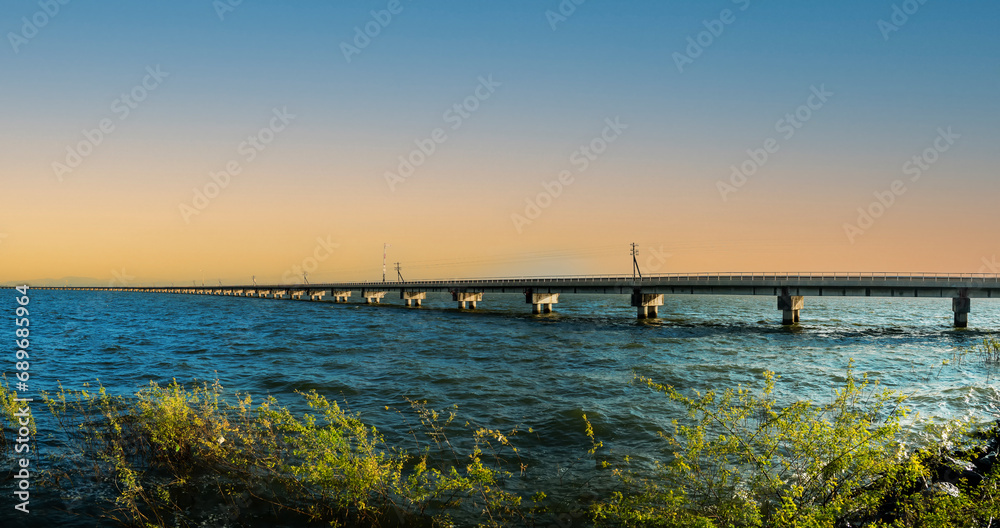Floating train on Pasak Jolasid dam at Khok Salung Train Station in Khok Salung, floating railway bridge over water reservoir at Pa Sak Cholasit Dam. Floating train on Pasak Jolasid dam at Khok Salung Train Station in Khok Salung, floating railway bridge over water reservoir at Pa Sak Cholasit Dam.