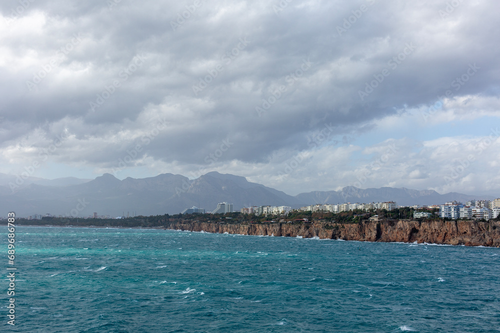 Winter clouds and wavy sea, location Antalya.