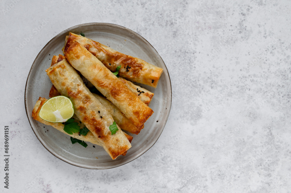 Turkish Cigara Börek (Sigara böreği) or Cigarette Pastry with Spinach and Feta Cheese with
