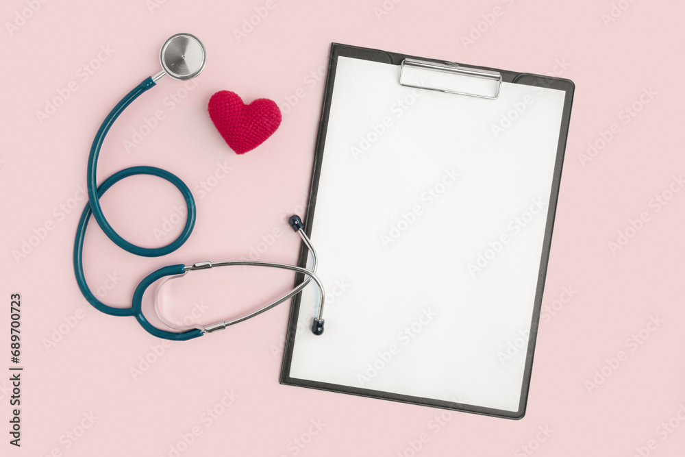 Medical stethoscope for checking pulse on a pink background with a red heart, with a tablet for prescriptions, advertising, logo. Medical concept. Place for text. Healthcare, cardiology. Medical stethoscope for checking pulse on a pink background with a red heart, with a tablet for prescriptions, advertising, logo. Medical concept. Place for text. Healthcare, cardiology.