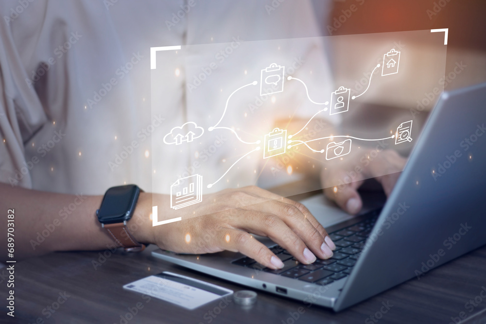 Document management system concept, data storage security, businessman using laptop access file documents on screen, financial documents Document management system concept, data storage security, businessman using laptop access file documents on screen, financial documents