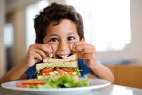 a young boy sneaking a bite of a clubhouse sandwich