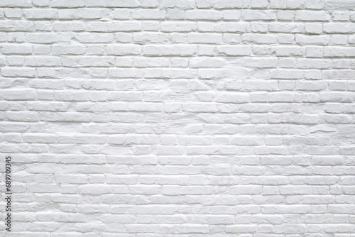 Photo background of white brick wall. Old grunge white painted brick wall texture background. Loft style wall. White brick Industrial abstract backdrop for photos, fabrics, textiles, papers