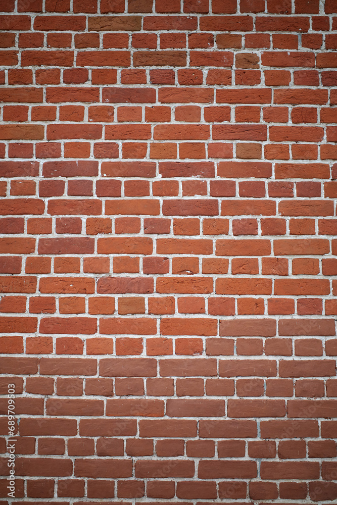 Red brick wall. Background, wallpapers for phone, smartphone, social networks. Photo of brickwork. Vertical size Red brick wall. Background, wallpapers for phone, smartphone, social networks. Photo of brickwork. Vertical size