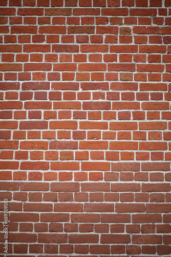 Red brick wall. Background, wallpapers for phone, smartphone, social networks. Photo of brickwork. Vertical size