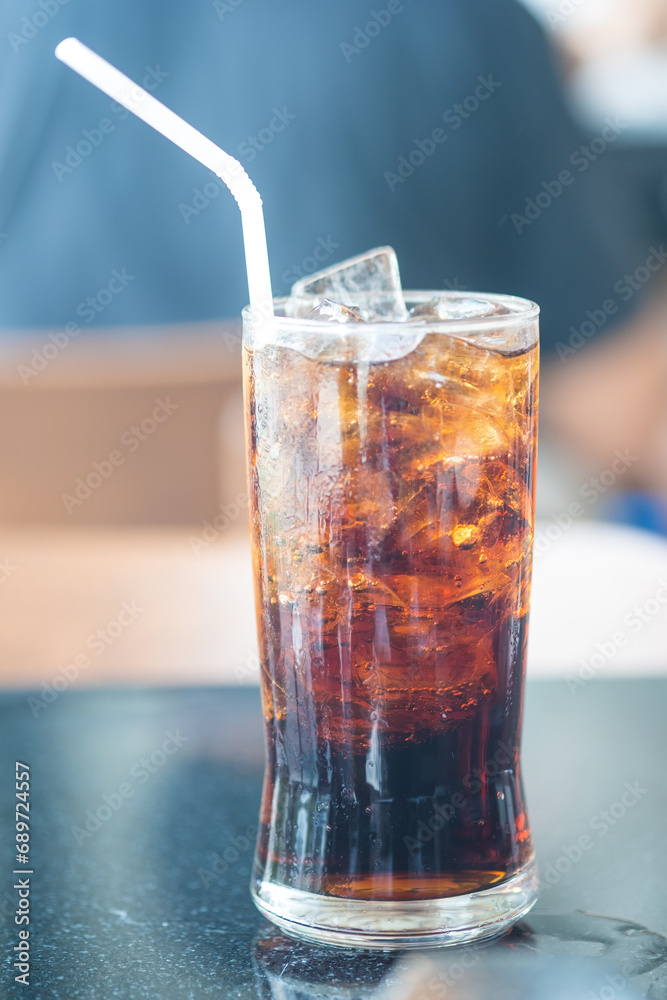 Refreshing soft drink with ice on the table. Close up Refreshing soft drink with ice on the table. Close up