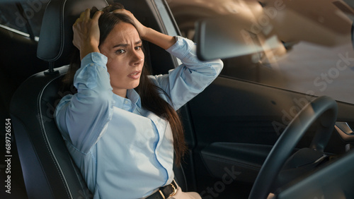 Frustrated stressed angry driver woman hit car steering wheel irritated angry Caucasian female worry traffic jam lateness business failure stress auto broken lost girl driving problem automobile crash photo