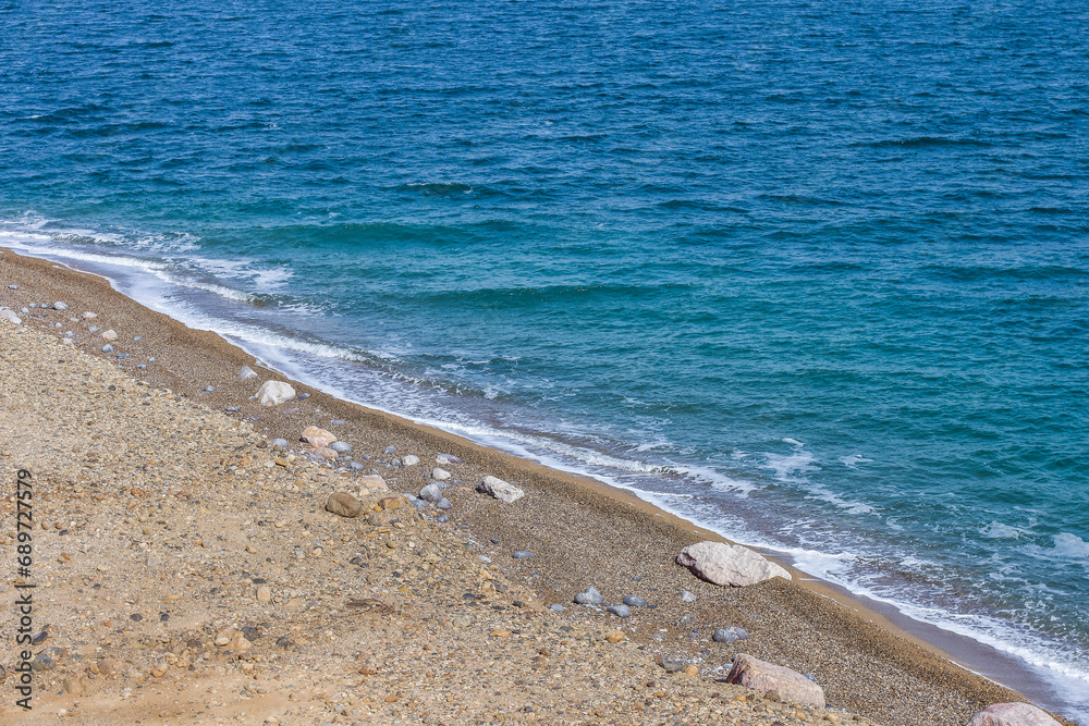 stone beach shore line of north sea with water nature simple local ordinary nature outdoor background concept picture stone beach shore line of north sea with water nature simple local ordinary nature outdoor background concept picture