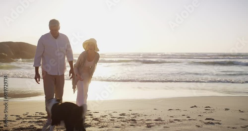 Senior couple, dog and fun on beach for care support and relax on weekend adventure. Mature man, woman and pet to play fetch with happy wellness, animal and florida vacation on retirement in sunset photo