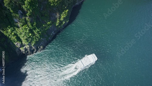 Ferry On Beautiful New Zealand River Near Waterfall - High, Drone Shot