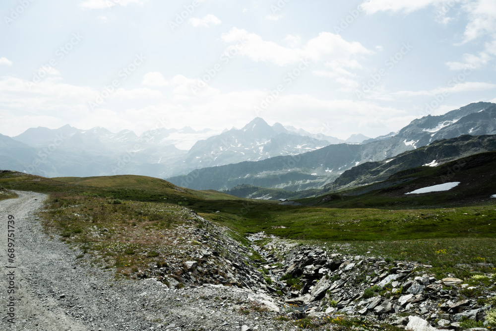 Fototapeta premium Summer Splendor: Peaks, Ice, Rocks, and Lakes. Alps. Aosta Valley. Italy.